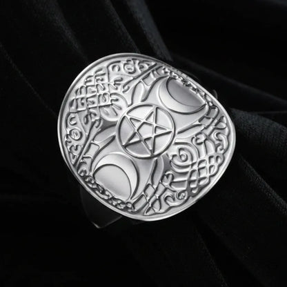 Silver triple moon pentacle ring, macro close-up of Celtic knotwork face design