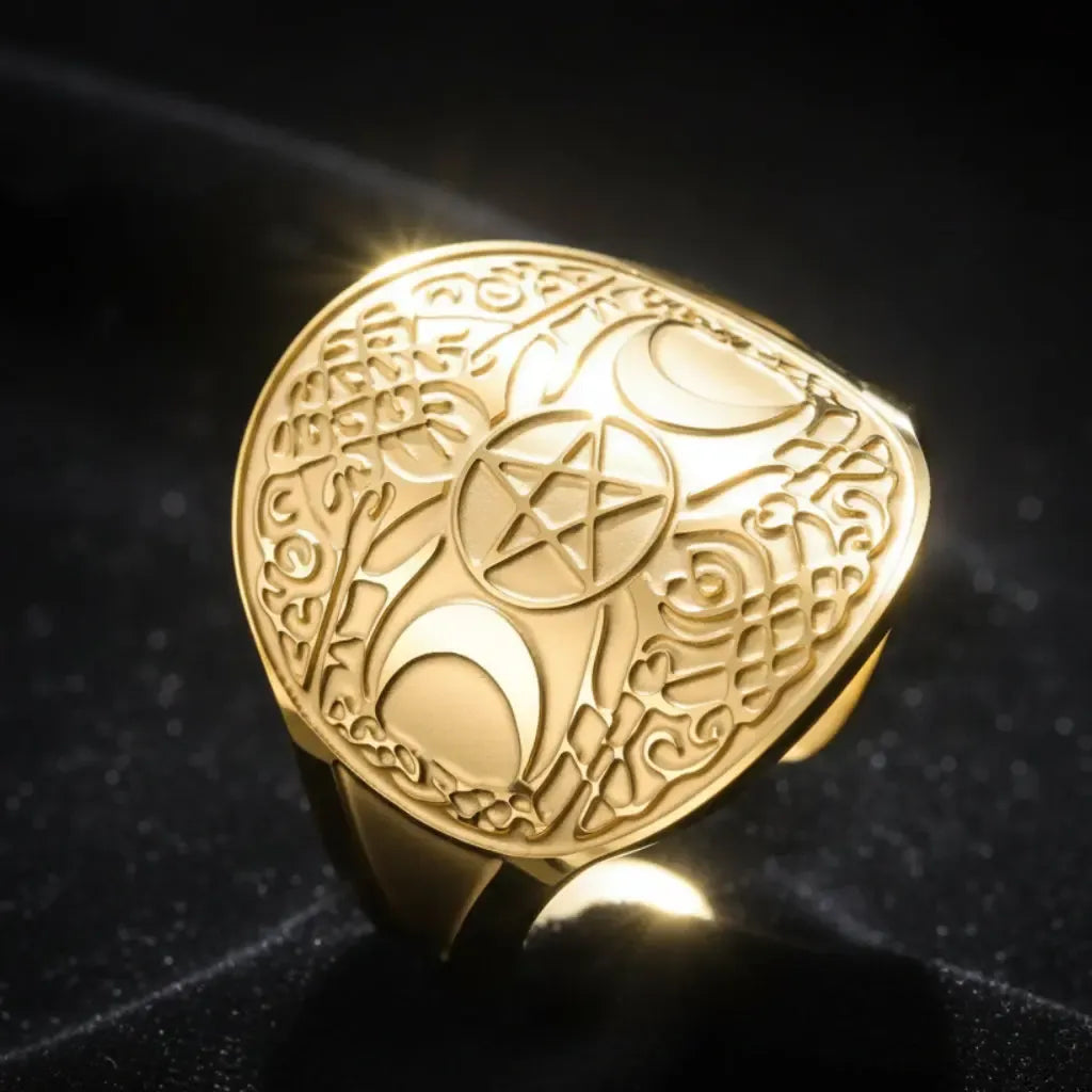 Gold triple moon pentacle ring, spotlight close-up on Celtic knotwork and open shank