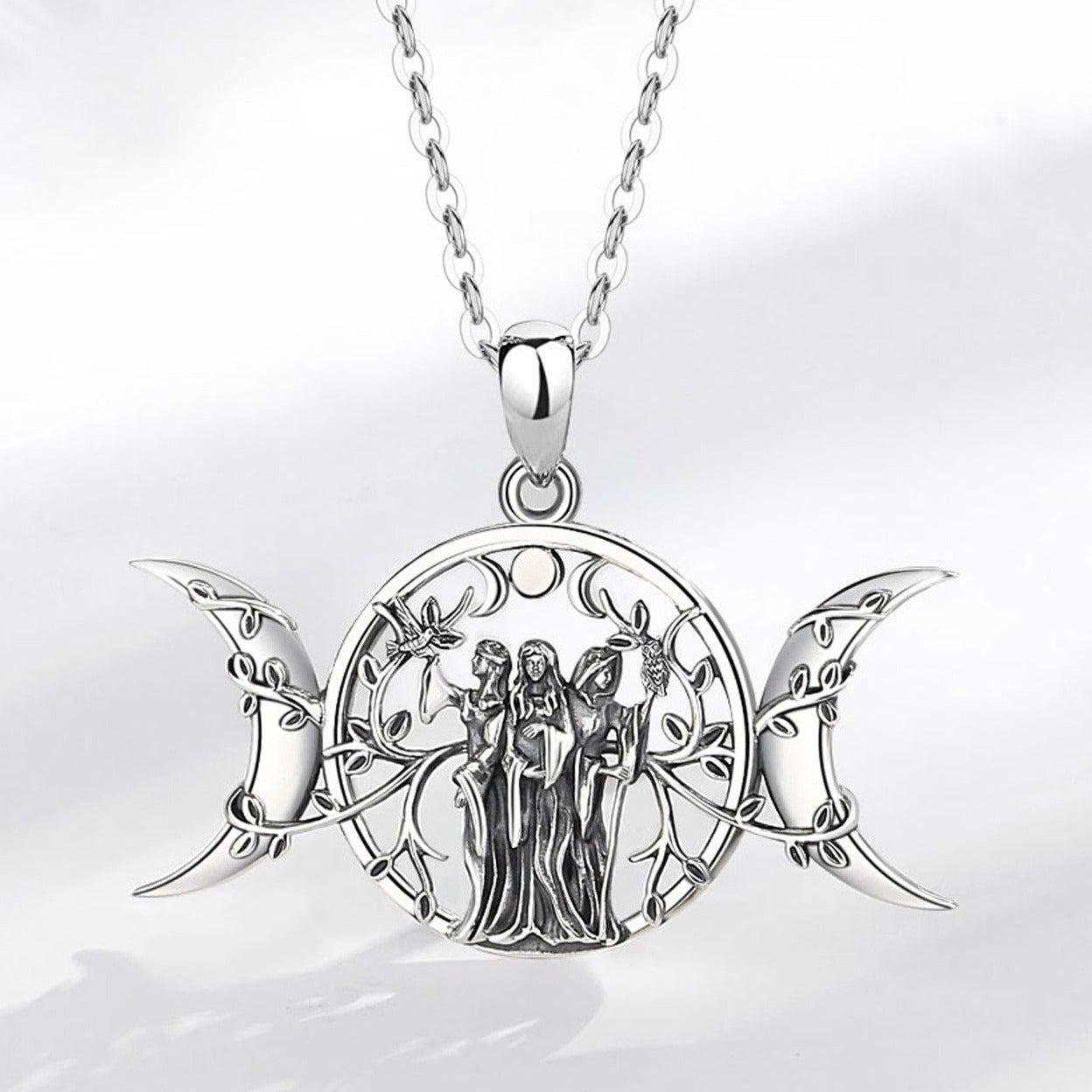 Sterling silver Triple Moon Goddess necklace with Hecate amulet, featuring three figures and intricate vine details.