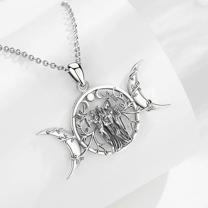 Sterling silver Triple Moon Goddess necklace with Hecate amulet, intricate tree and figures.