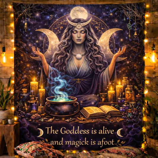 Mystical Triple Moon Goddess tapestry with a celestial woman, candles, cauldron, and "The Goddess is alive and magick is afoot" text.