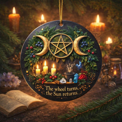 Black ceramic Yule ornament with gold Triple Moon Pentacle, candles, berries, and "The wheel turns, the Sun returns.