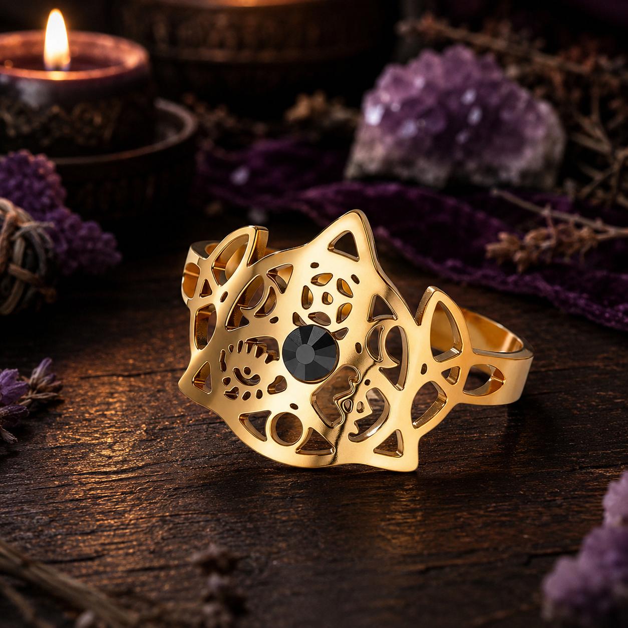 Gold Celtic Knot open ring with black stone in a Pagan altar scene