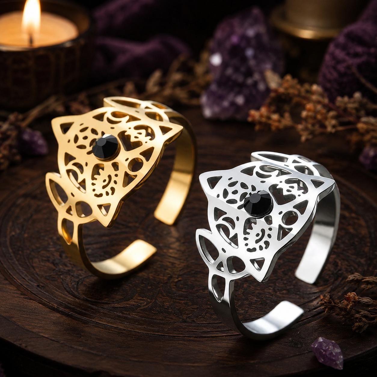 Gold and steel Celtic Knot adjustable rings in a Pagan altar scene