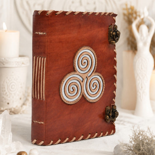 Triskele Cut-Work Leather Journal – Handmade Pagan Grimoire with Dual Locks – leather journal, front cover view