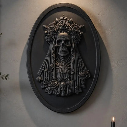 Skeleton bride plaque in a moody room with flowers and candles