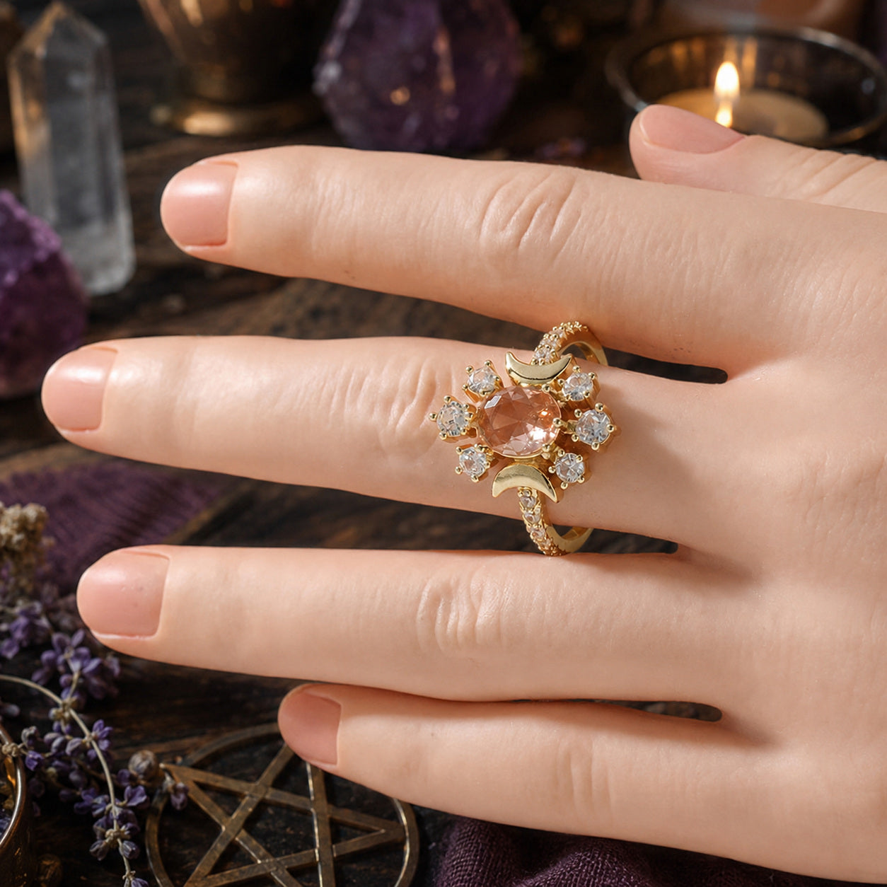 Vintage Triple Moon zircon ring worn on hand in a Wiccan altar scene
