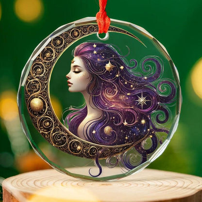 Clear glass ornament with a purple-haired Star Moon Goddess, golden crescent, and celestial details.