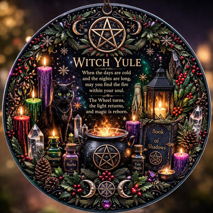 Round black ceramic Witch Yule ornament with pentacle, black cat, candles, cauldron, and winter foliage.