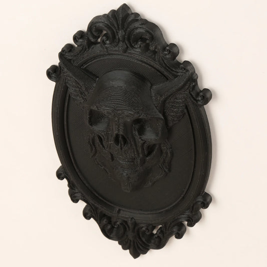 Winged Demon Skull Relief Wall Hanging – styled on wall