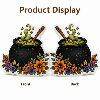 Front and back views: decorative plush pillow featuring cauldron and potion artwork