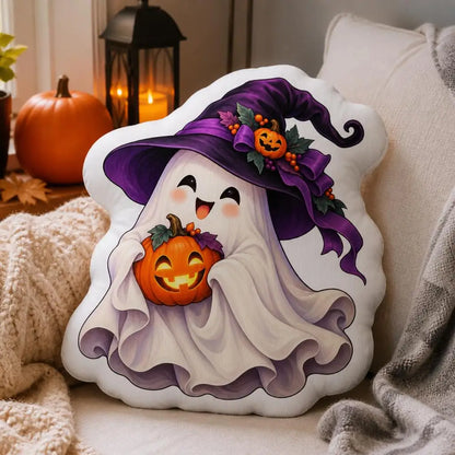 Styled on a sofa: witch ghost pumpkin plush pillow with witch ghost and jack-o-lantern artwork