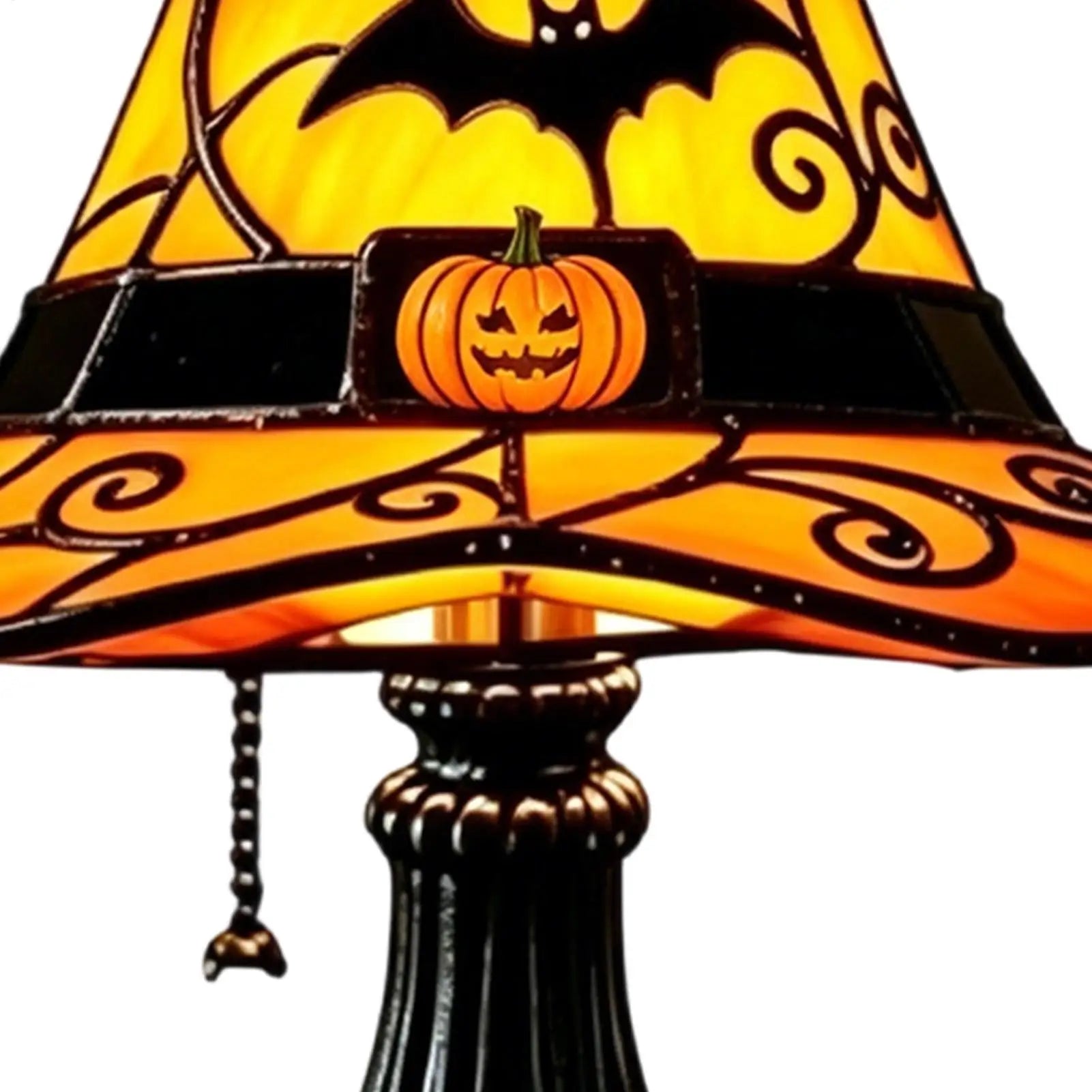 Witch hat table lamp close-up with bat cutout and pumpkin buckle detail