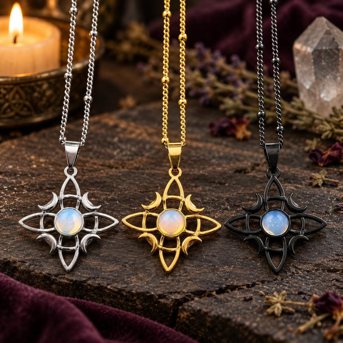 Witch knot moon necklaces with round stone centers shown in three metal finishes in a witchy altar setting