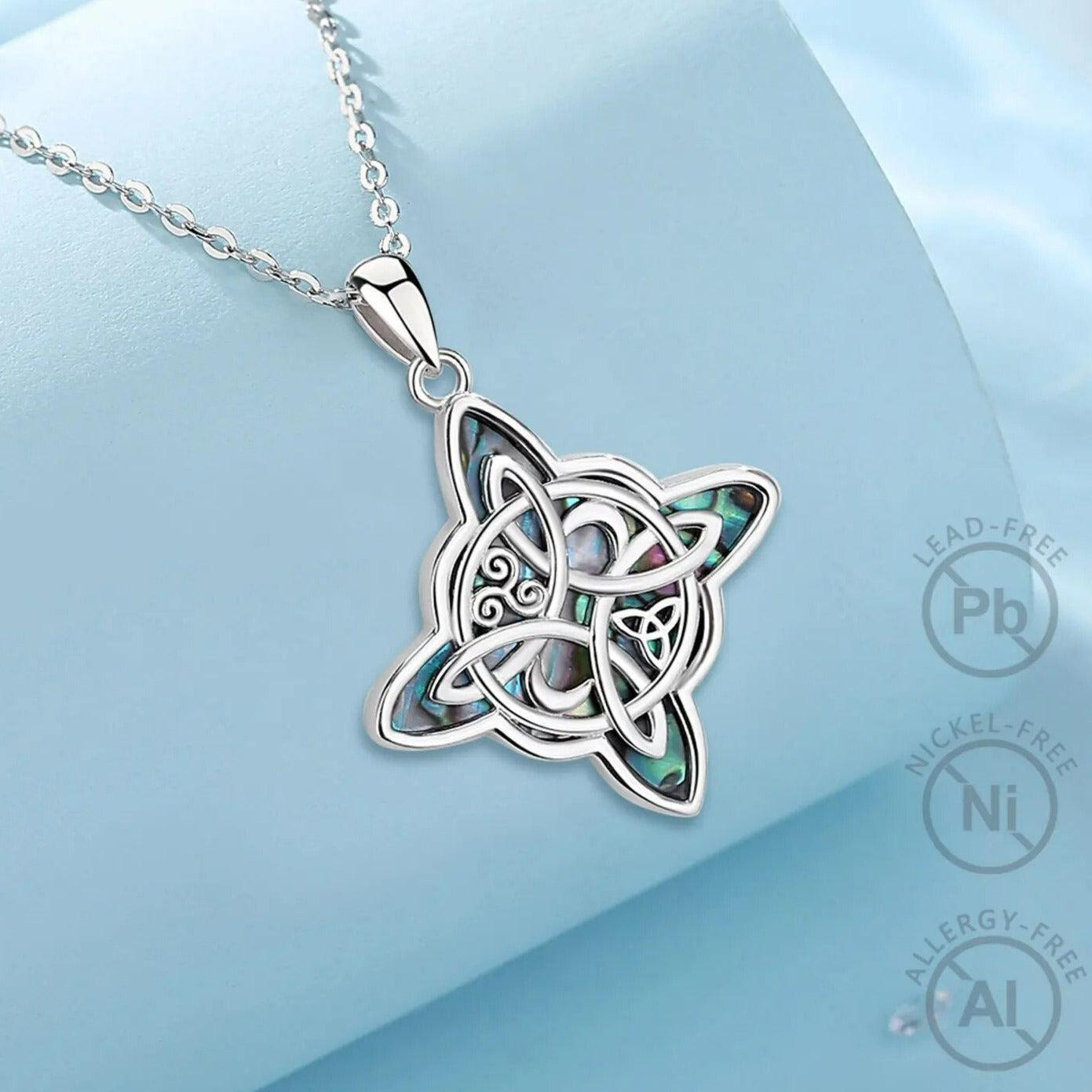 Sterling silver Witch Knot Moon necklace with iridescent abalone shell inlay, 18-inch chain.