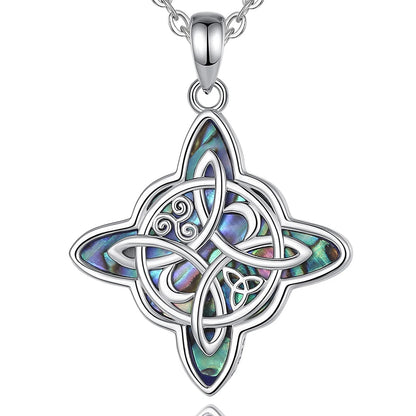 Sterling silver Witch Knot pendant with iridescent abalone shell inlay, symbolizing protection and spiritual balance.