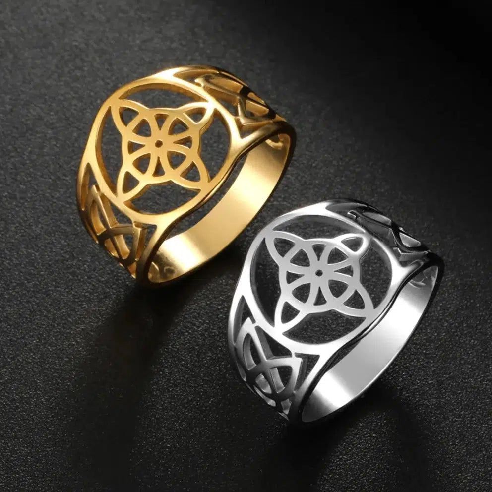 Gold and silver stainless steel Witch Knot rings with intricate Celtic Triquetra design.