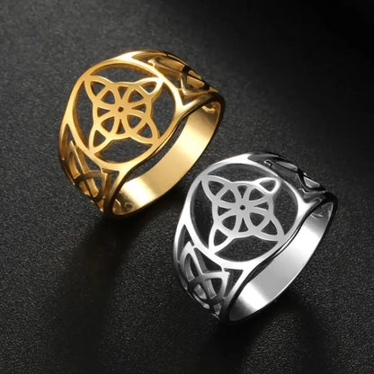 Gold and silver stainless steel Witch Knot rings with intricate Celtic Triquetra design.