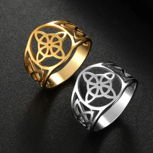 Gold and silver stainless steel Witch Knot rings with intricate Celtic Triquetra design.