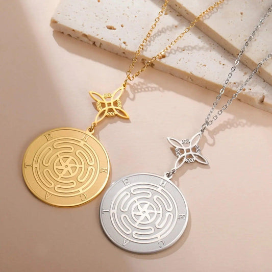 Gold and silver stainless steel Hecate Wheel necklaces with Witch Knot pendants.