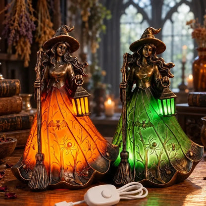 Two witch lamps on a table beside a USB cord
