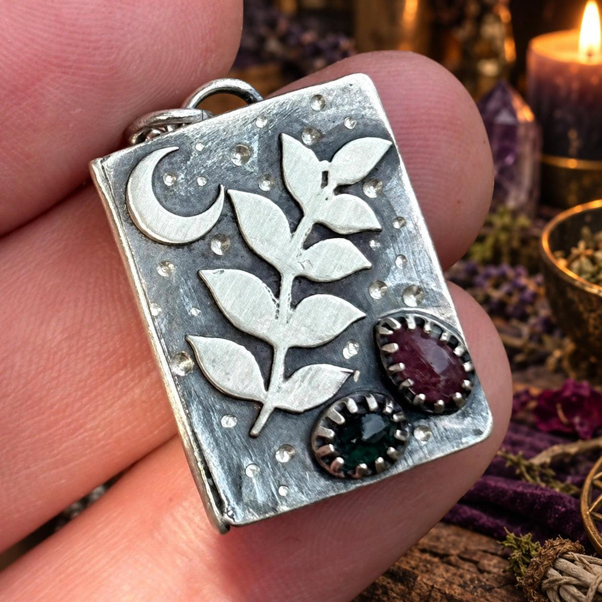 Herbal grimoire pendant necklace with leaf sprig, crescent moon and garnet gemstones - wiccan book pendant