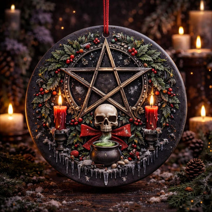 Gothic ceramic Yule ornament with pentacle, skull, red candles, and a steaming cauldron, framed by winter foliage.