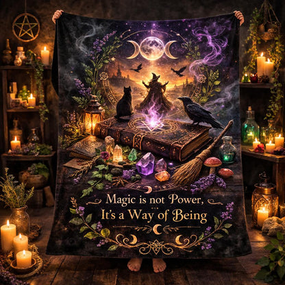 Witchcraft-themed fleece blanket with a witch, black cat, crow, mystical symbols, crystals, and "Magic is not Power, It's a Way of Being" text.