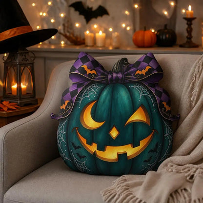 Styled room view: decorative plush pillow featuring witch-inspired jack-o-lantern artwork