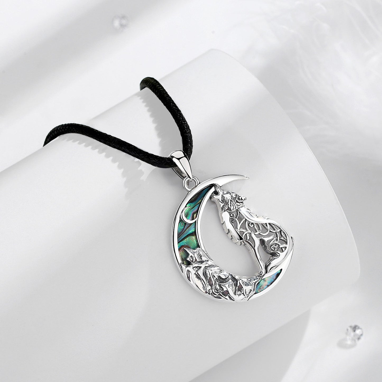 Enchanting 925 Sterling Silver Witchy Wolf Moon Necklace with iridescent abalone inlay on a black rope chain.