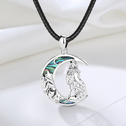 Enchanting 925 Sterling Silver Witchy Wolf Moon Necklace with iridescent abalone inlay on a black cord.
