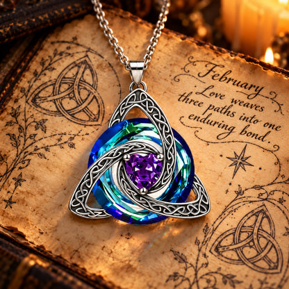 February Celtic Trinity Knot Birthstone Necklace on parchment — Love weaves three paths into one enduring bond.
