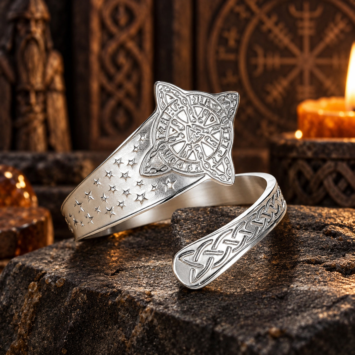 Celtic Witch Knot Ring with Triquetra & Rune Wheel Engraving in a dark pagan Viking altar setting, detailed polished metal finish