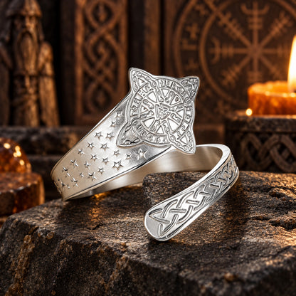 Celtic Witch Knot Ring with Triquetra & Rune Wheel Engraving in a dark pagan Viking altar setting, detailed polished metal finish