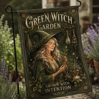 Green Witch Garden house flag displayed outdoors on a garden flag stand