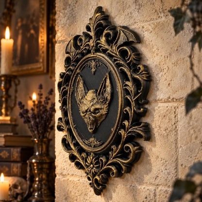 Side view of bat plaque: Gothic Bat Relief Wall Plaque, featuring a central bat relief, an oval medallion and elaborate Victorian scrollwork.
