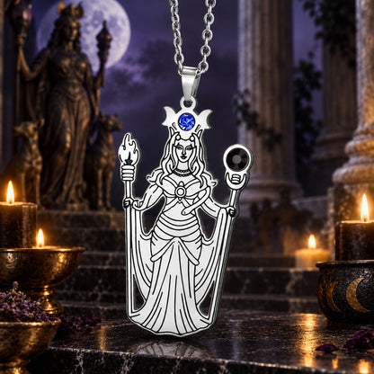 Greek Hecate Goddess Pendant Necklace in Stainless Steel in a dark Greek goddess altar setting, detailed polished metal finish