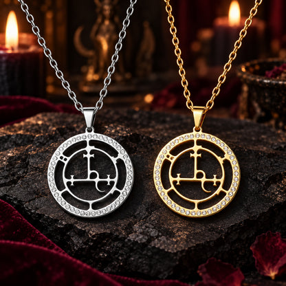 Silver and gold Lilith sigil necklace with zircon details in a dark altar setting