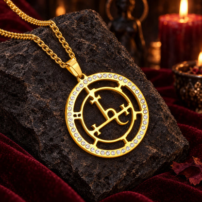 Gold Lilith sigil necklace with zircon details in a dark altar setting