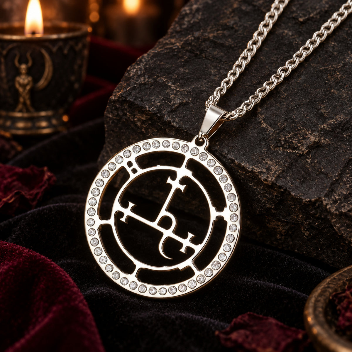Silver Lilith sigil necklace with zircon details in a dark altar setting