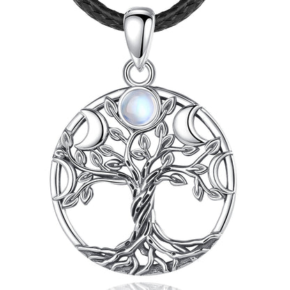 Sterling silver Tree of Life pendant with moon phases and a luminous moonstone, on a black leather cord.