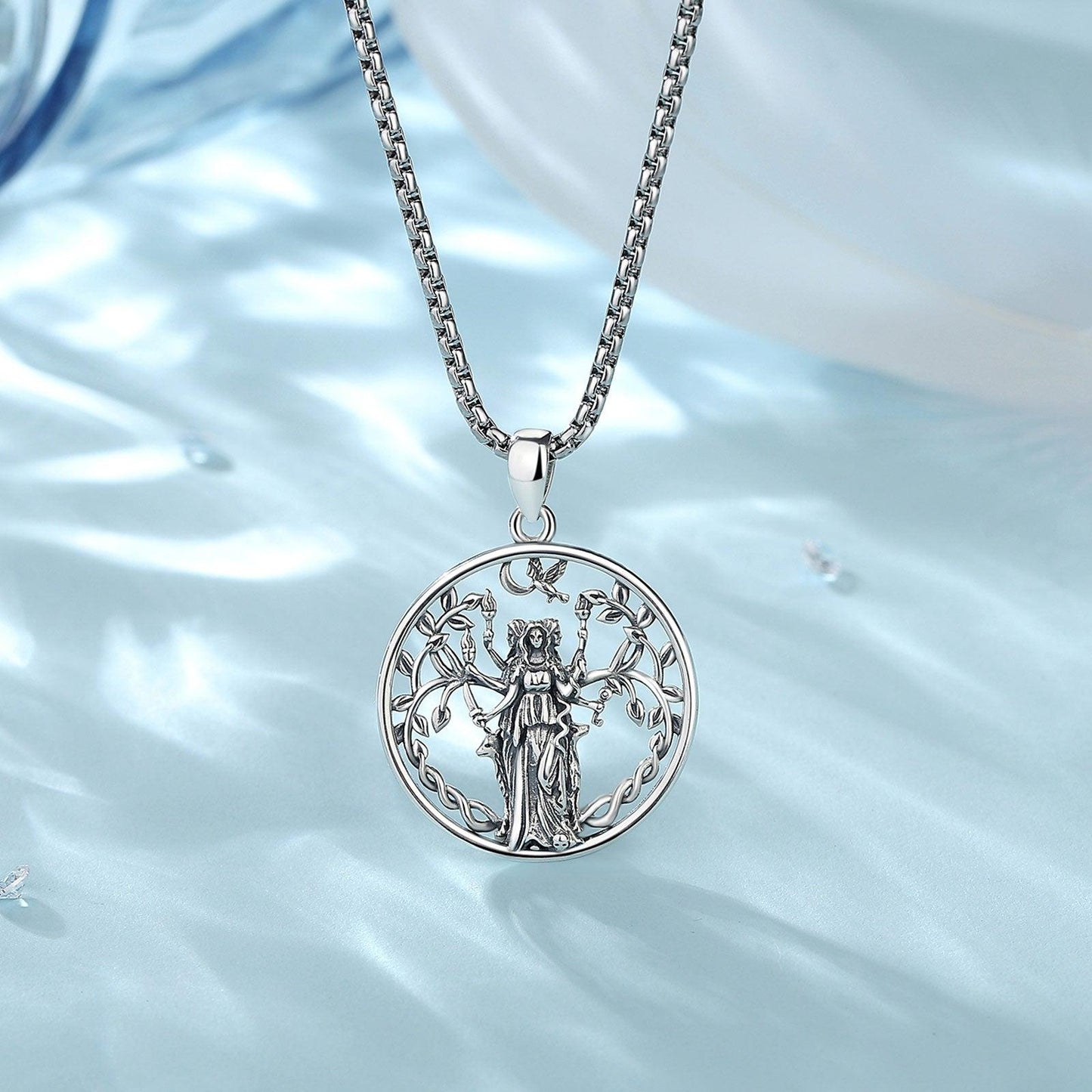 925 Sterling Silver Triple Moon Goddess Hecate necklace with detailed Tree of Life and dove design.