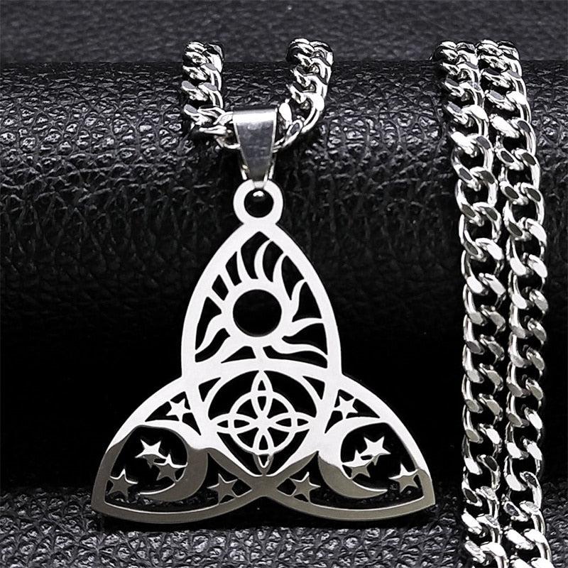 Silver Celtic Knot Triquetra necklace with sun, moon, and stars design on a curb chain.